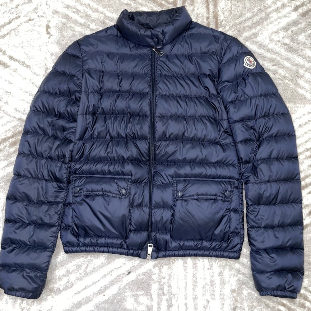 Navy Moncler jacket in perfect condition light weight and super comfortable